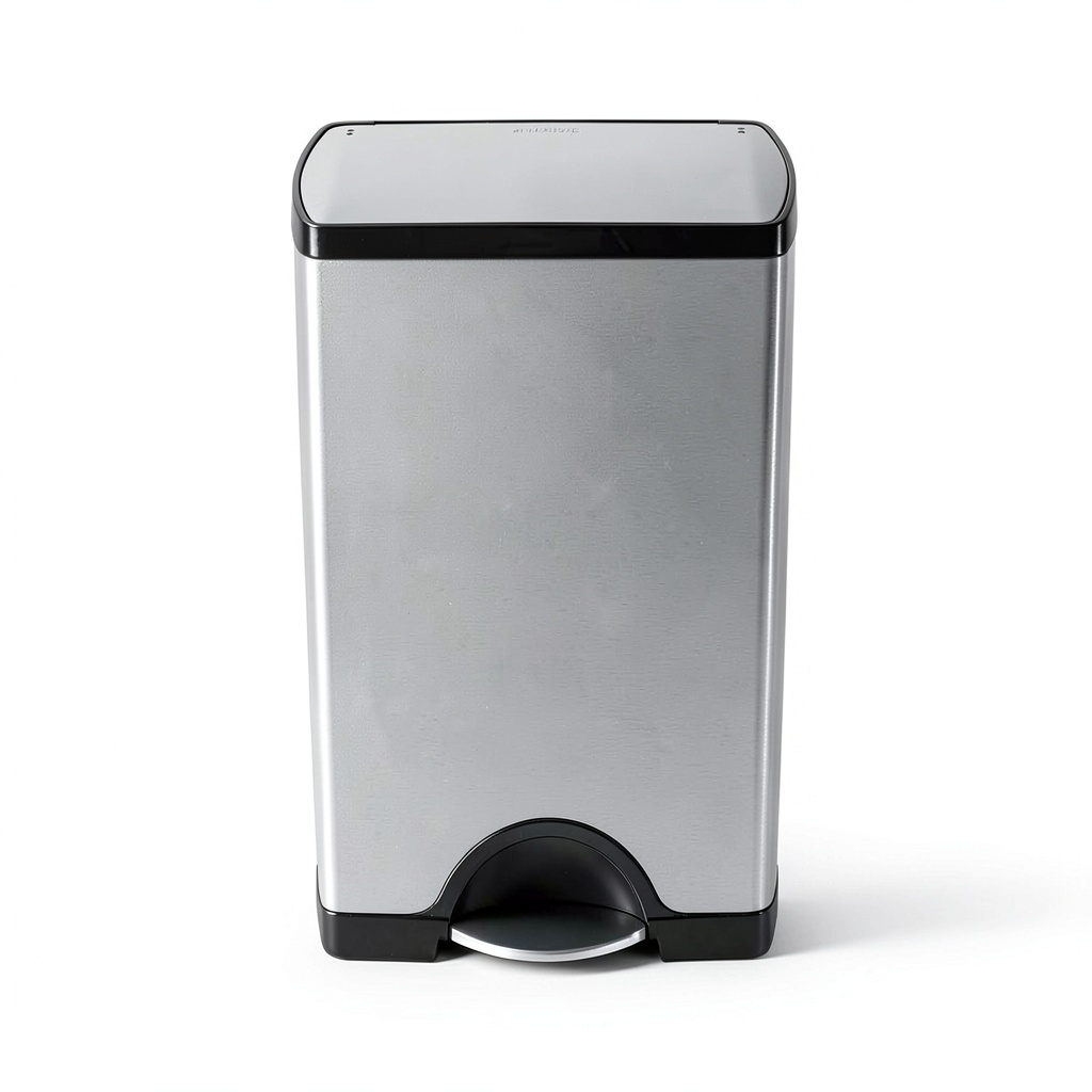 Simplehuman stainless steel trash can in a modern kitchen setting